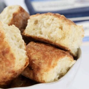 A bowl of cheese scones.