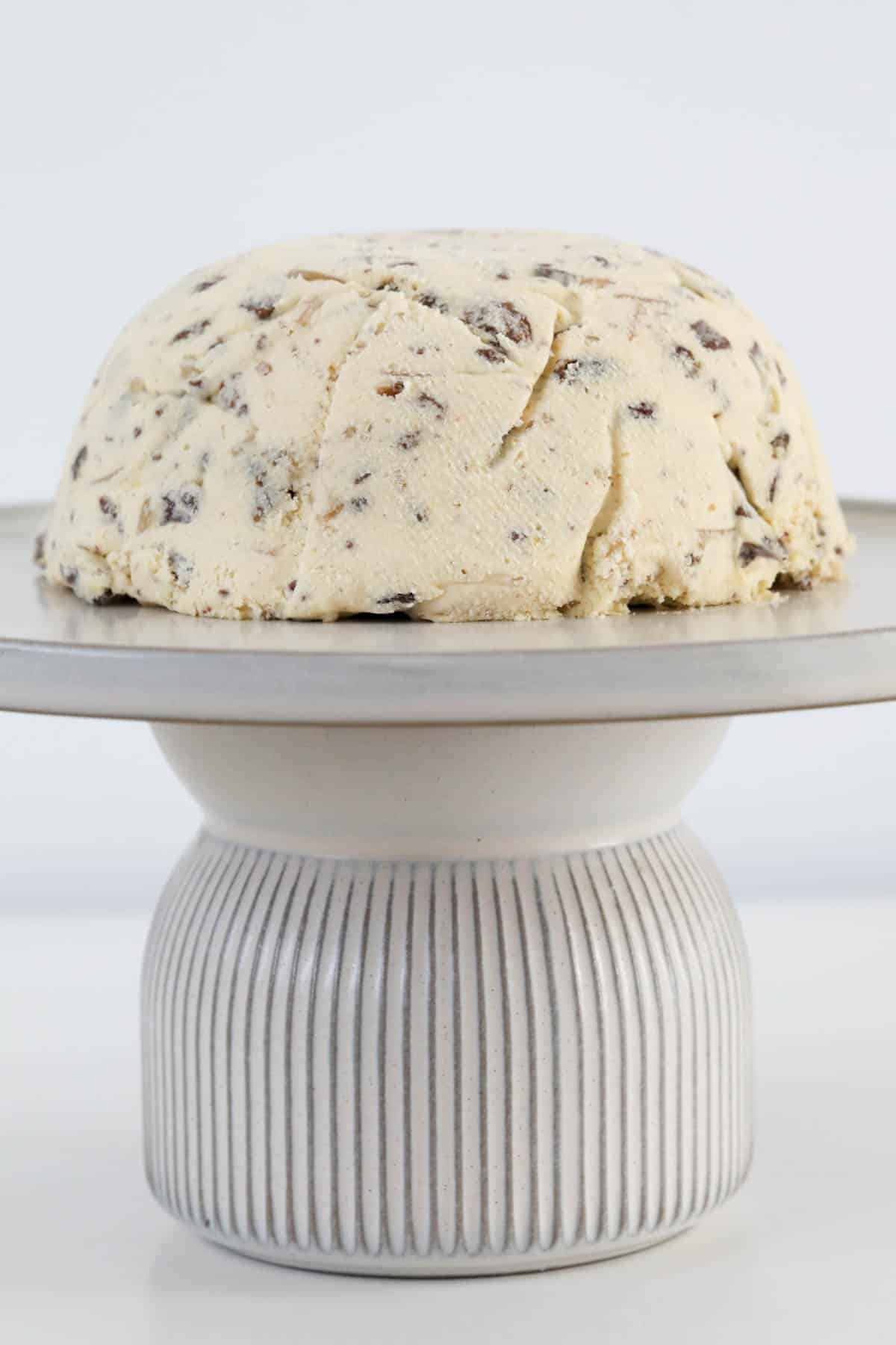 A creamy Pashka served on a cake stand,