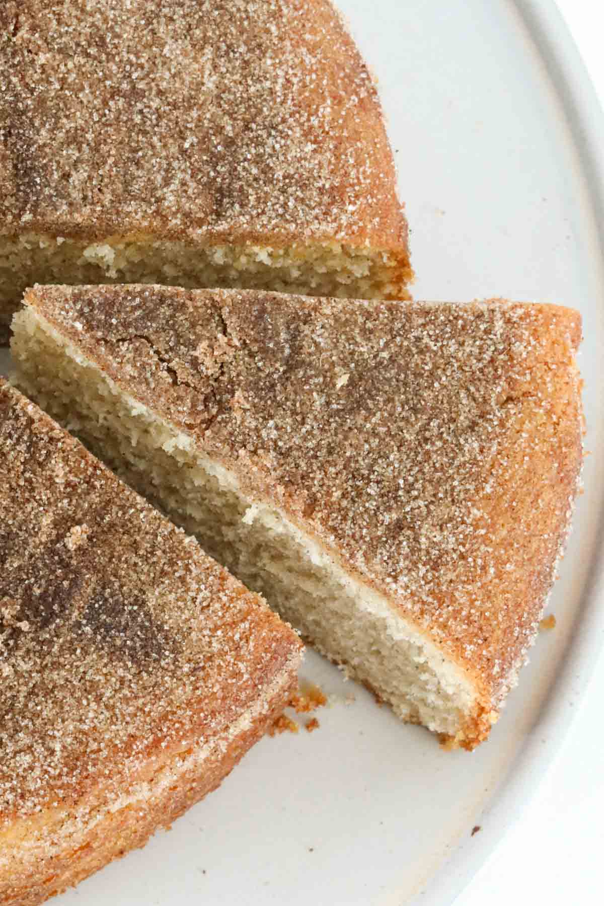 An overhead shot of the cinnamon tea cake showing its sugary topping.