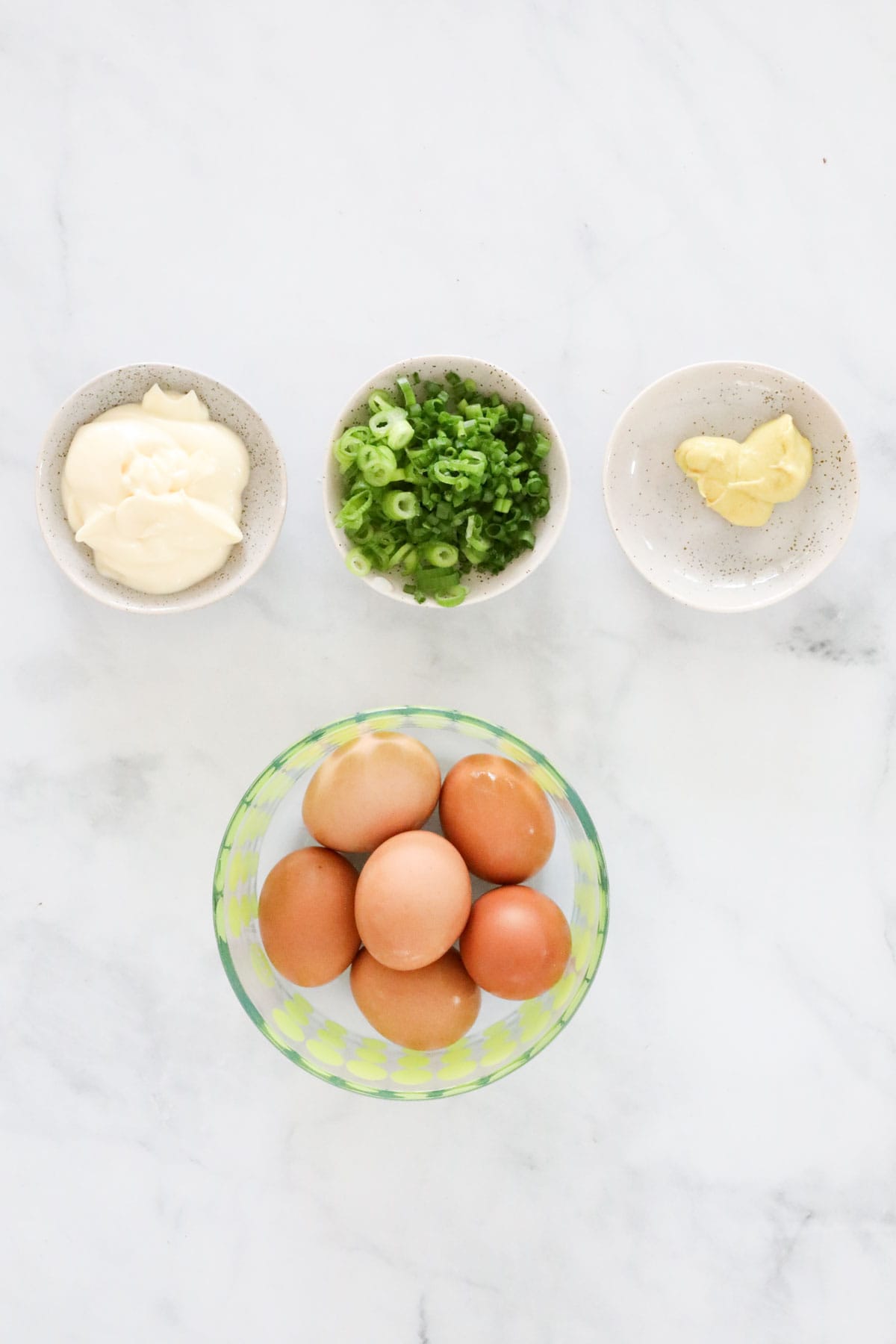 Ingredients needed to make egg mayo sandwiches.