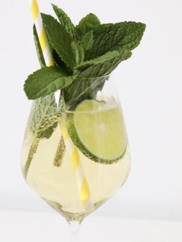 A classic elderflower cocktail Hugo Spritz with mint and lime.