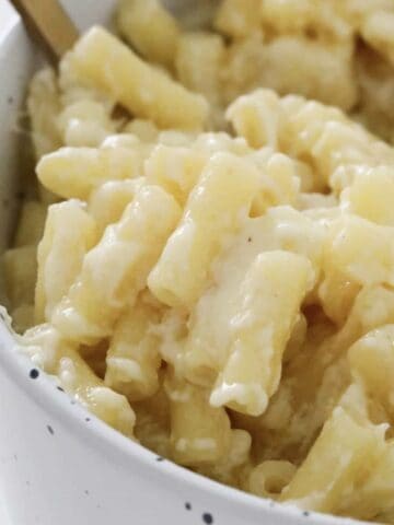 Creamy and cheesy mac and cheese in a bowl.