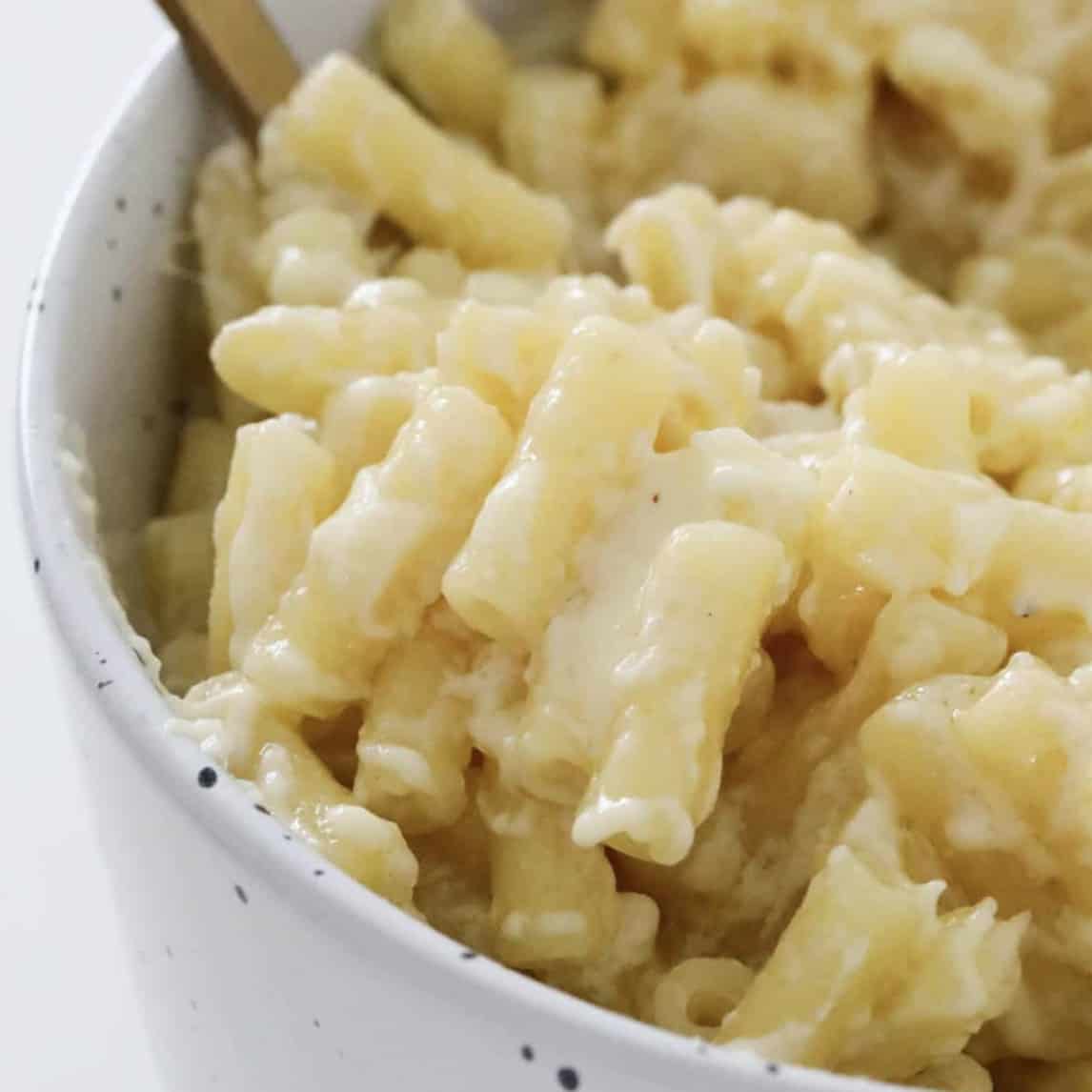 Creamy and cheesy mac and cheese in a bowl.