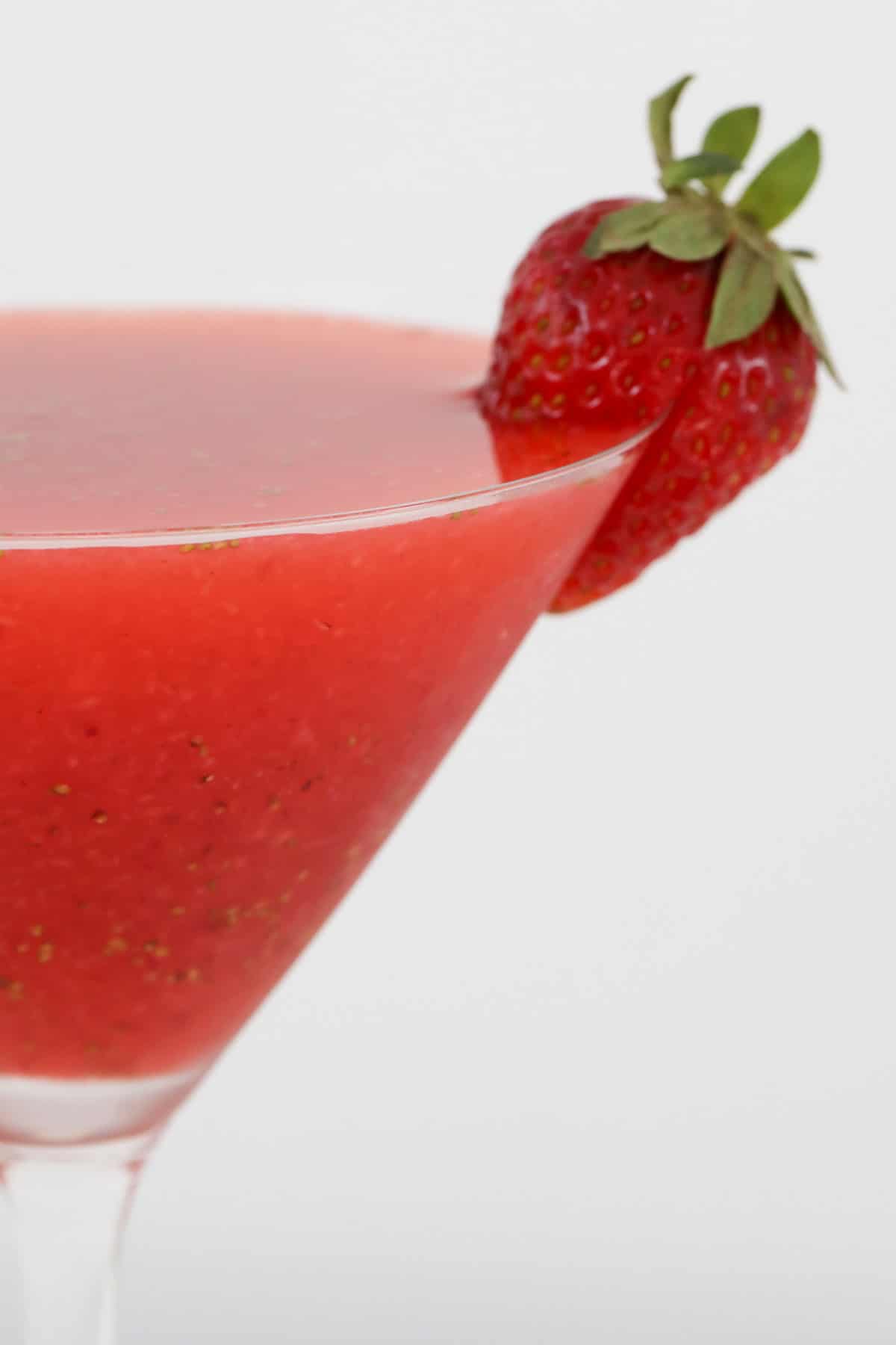 Close up of a red fruity cocktail.