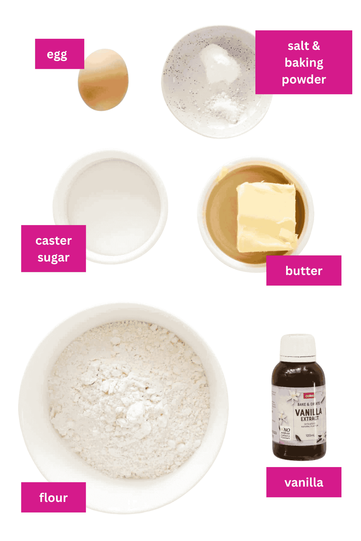 The ingredients for sugar cookies in small bowls.