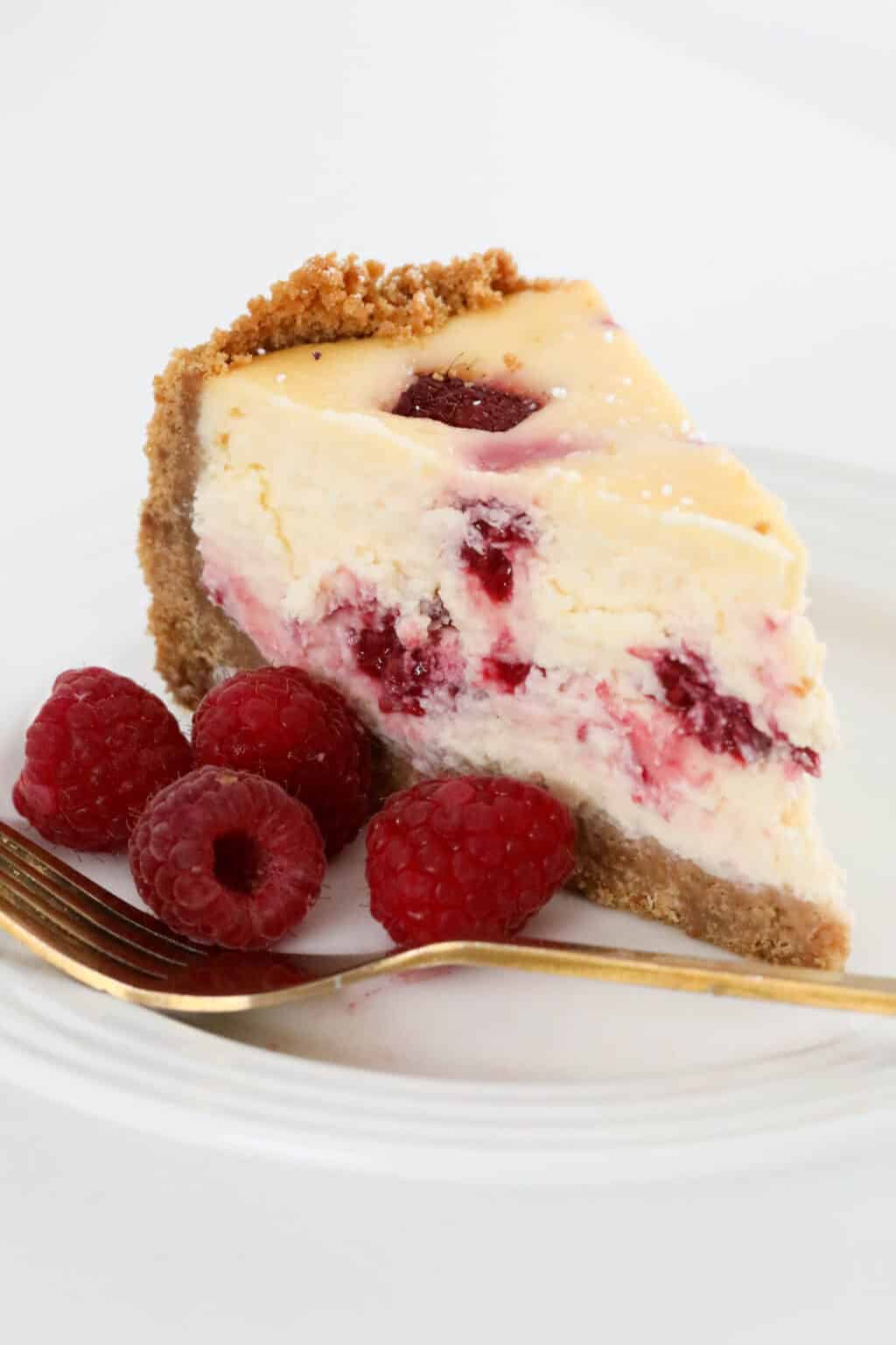 The ULTIMATE Raspberry Baked Cheesecake Recipe! - Bake Play Smile