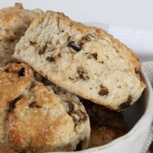 A baked scone with chunks of dried pitted dates throughout.