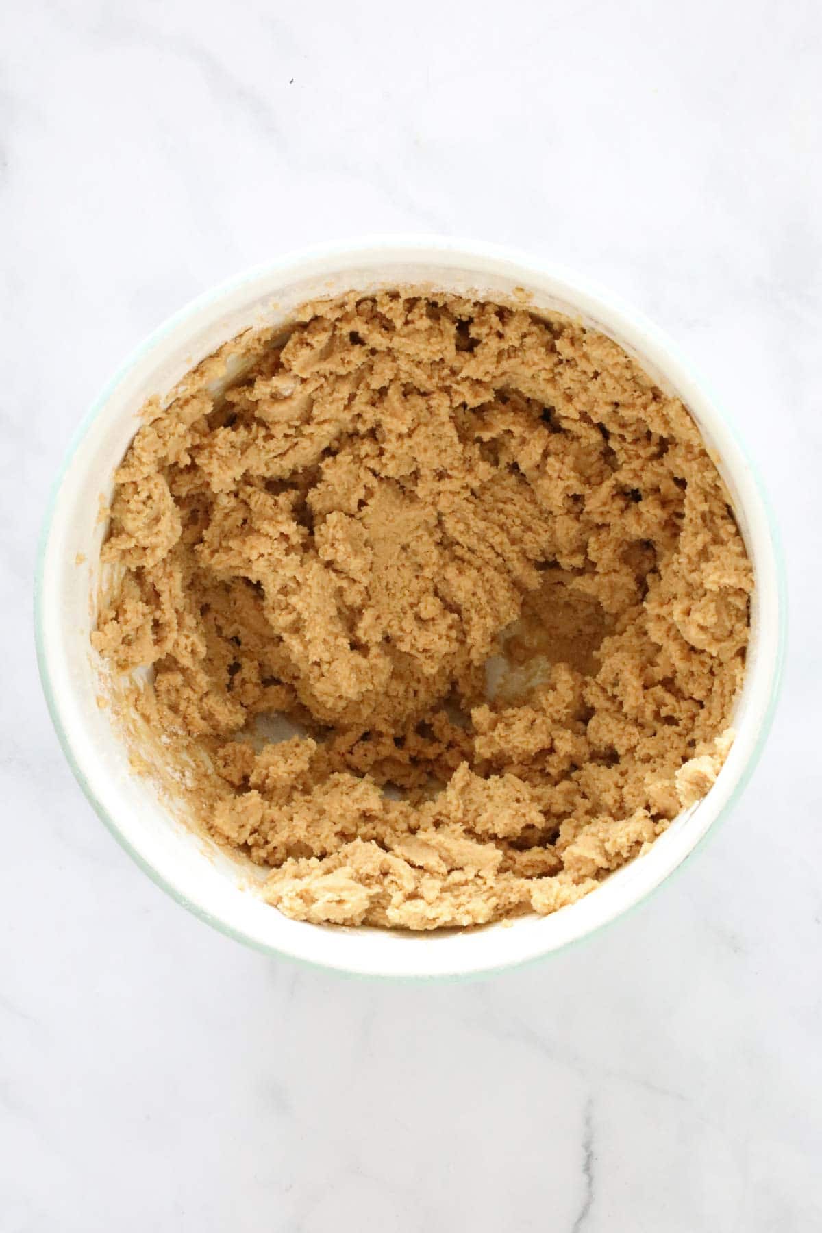 The combined peanut butter cookie dough mixture.