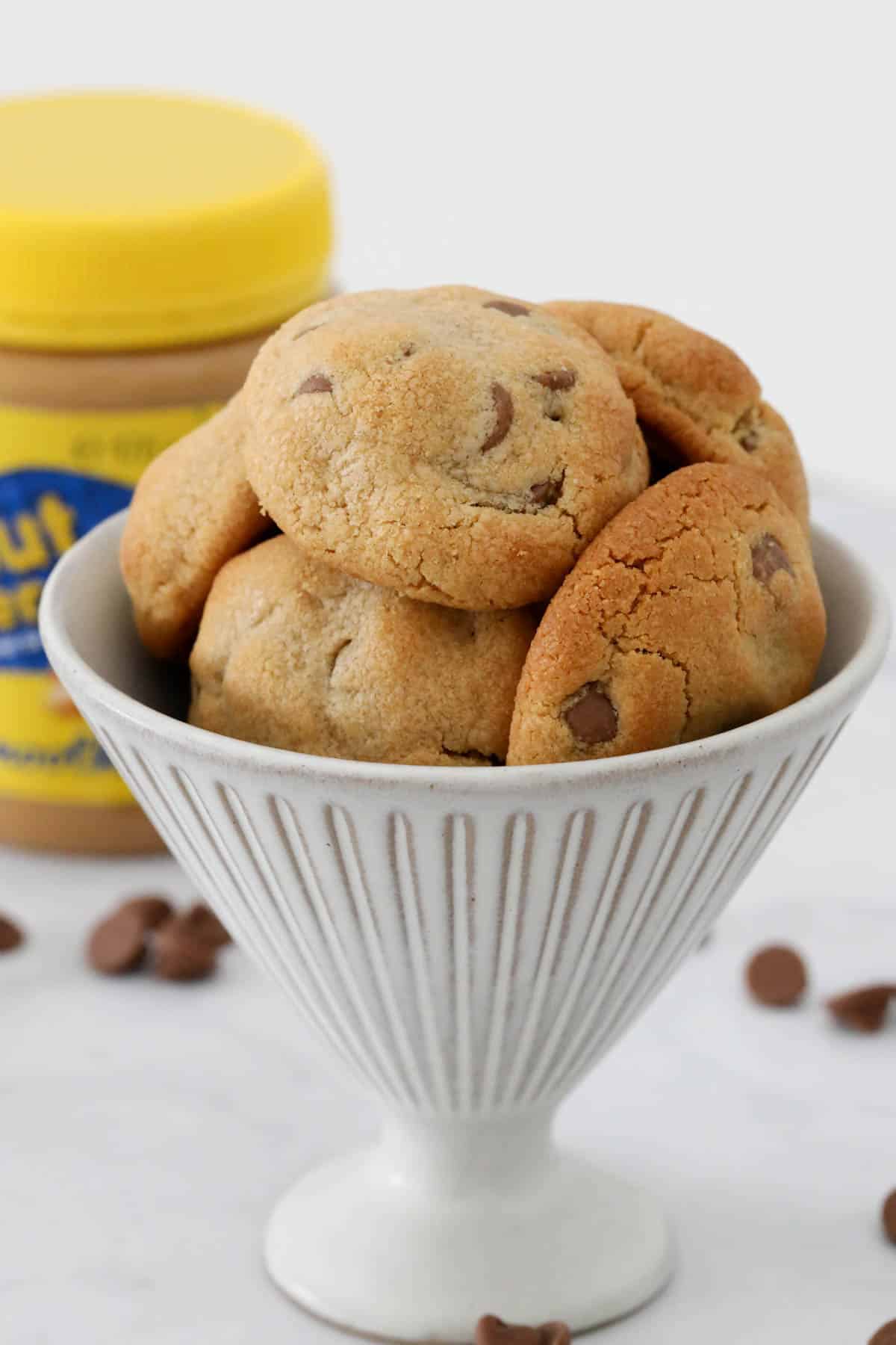 A batch of cookies in a tall bowl.