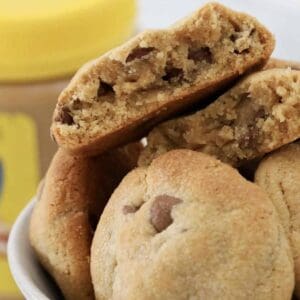 A soft and chewy peanut butter cookie with chocolate chips inside.