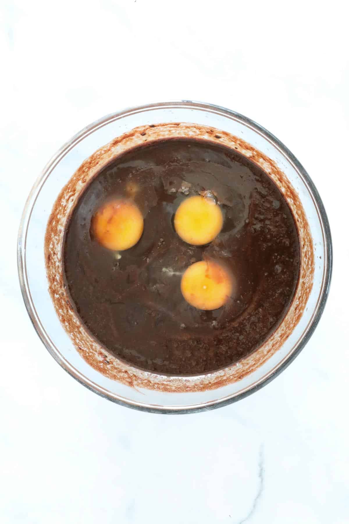 Eggs added to the brownie batter.