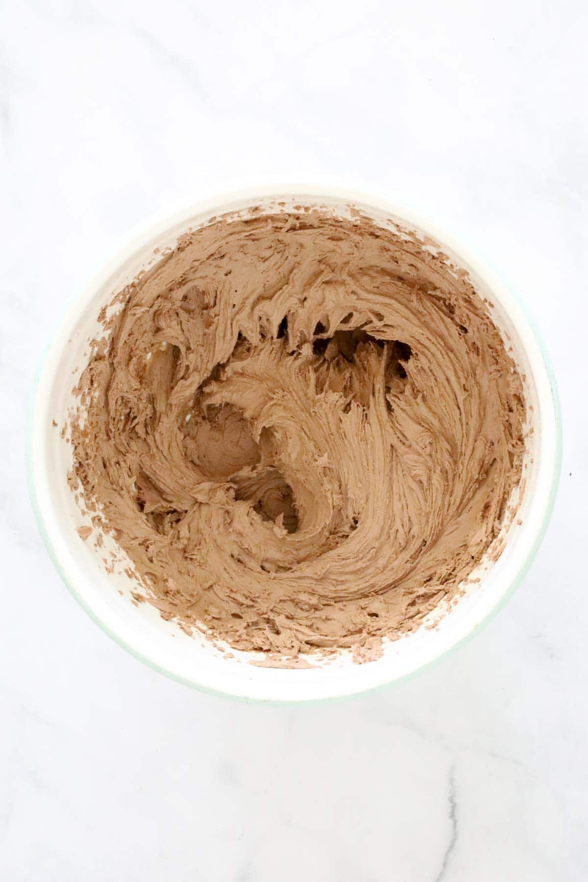 Bowl of made chocolate buttercream.