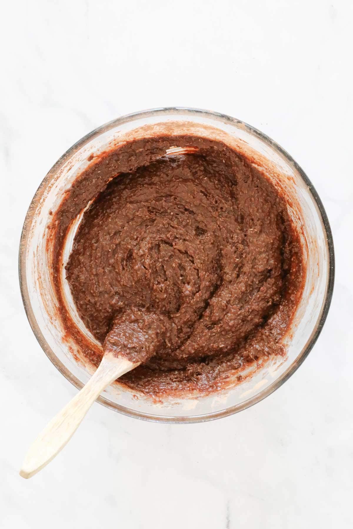 The combined chocolate cake batter in the mixing bowl.