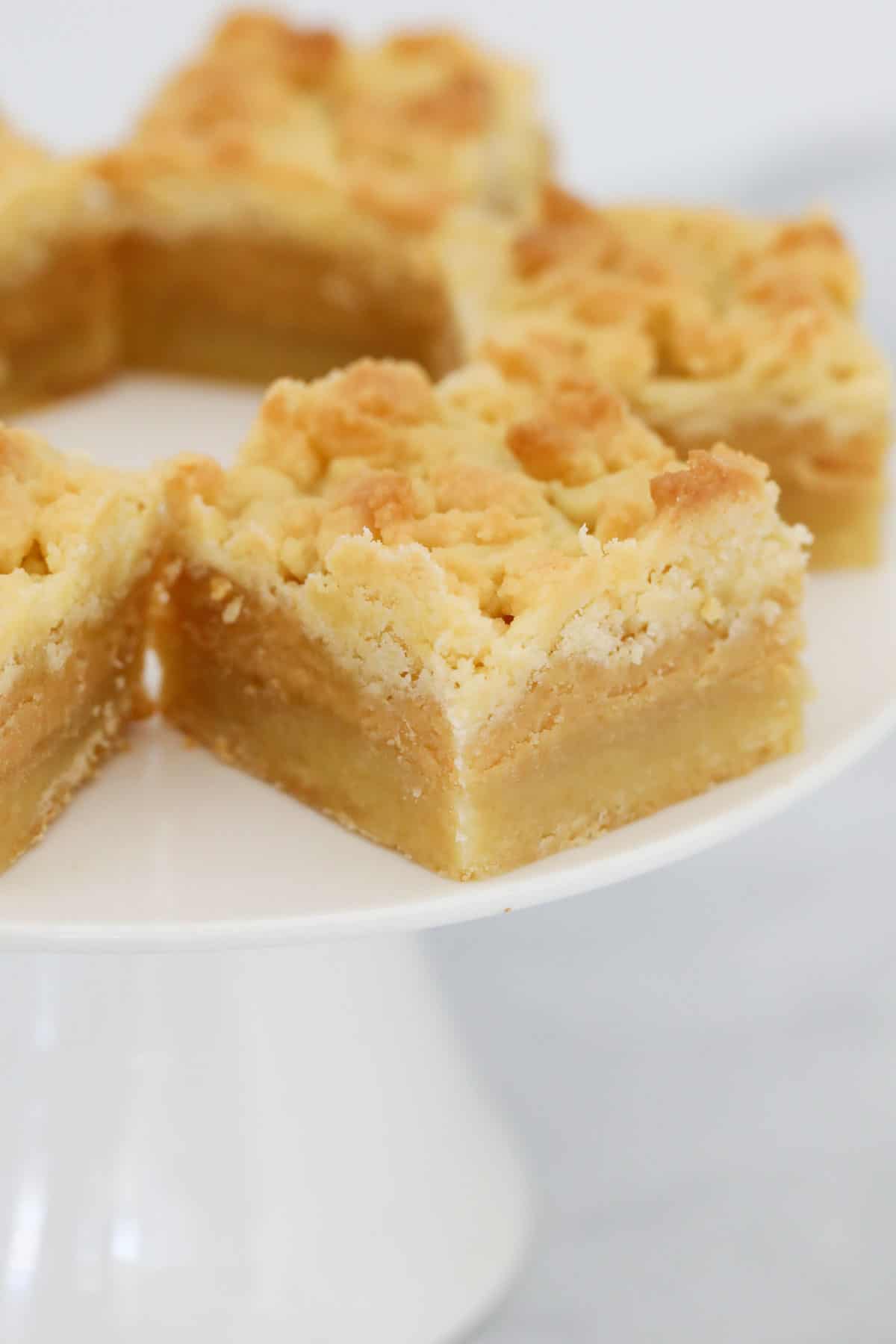 Tan Slice squares showing a rich caramel filling.