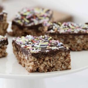 Chocolate rice krispie slice with sprinkles.