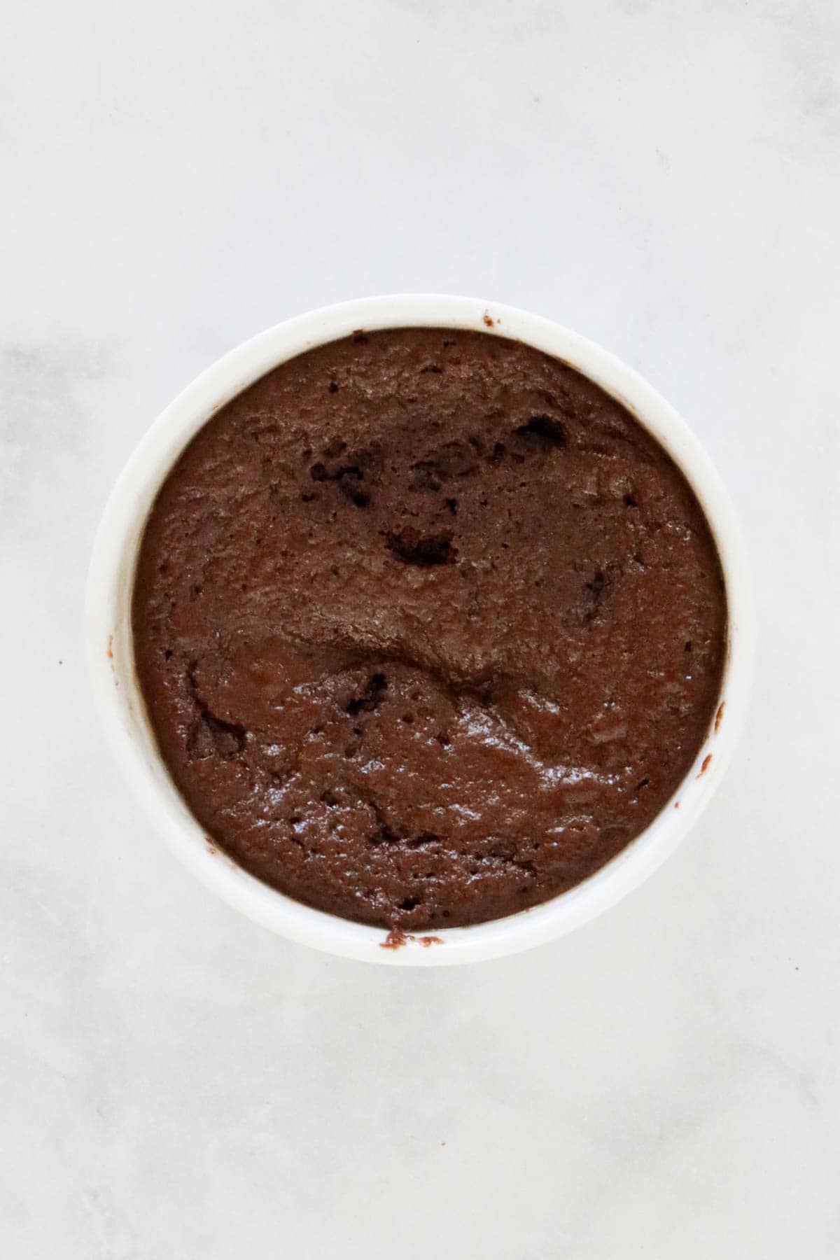 The top of the microwaved mug cake.