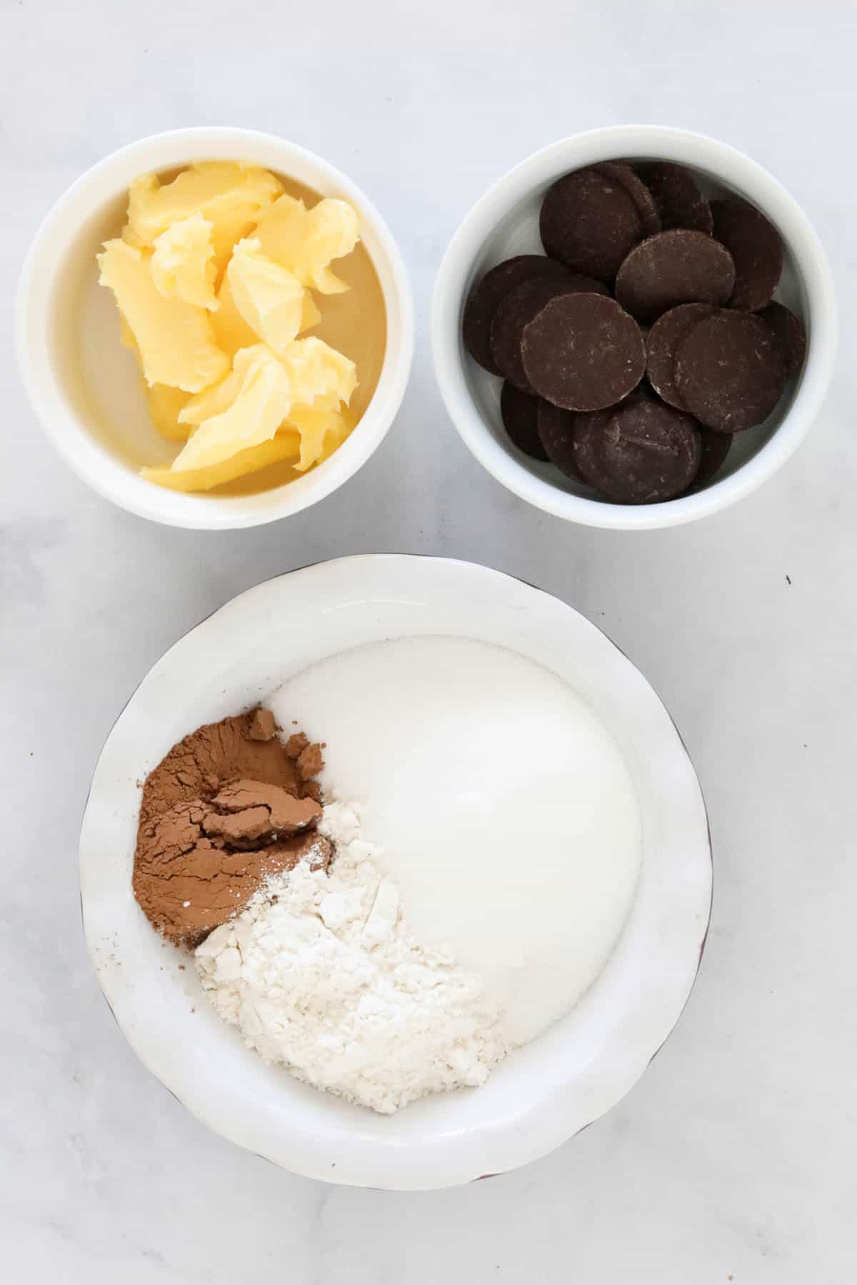 Ingredients needed to make the recipe weighed out and placed in individual bowls.