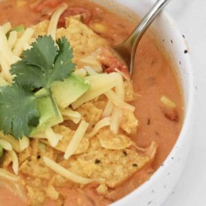 A bowl of creamy Mexican chicken soup.