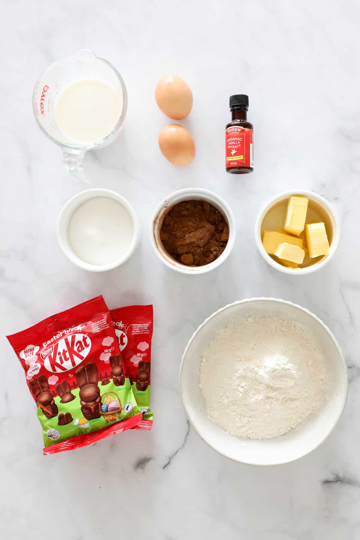 Ingredients needed to make cupcakes weighed out and placed in individual bowls.