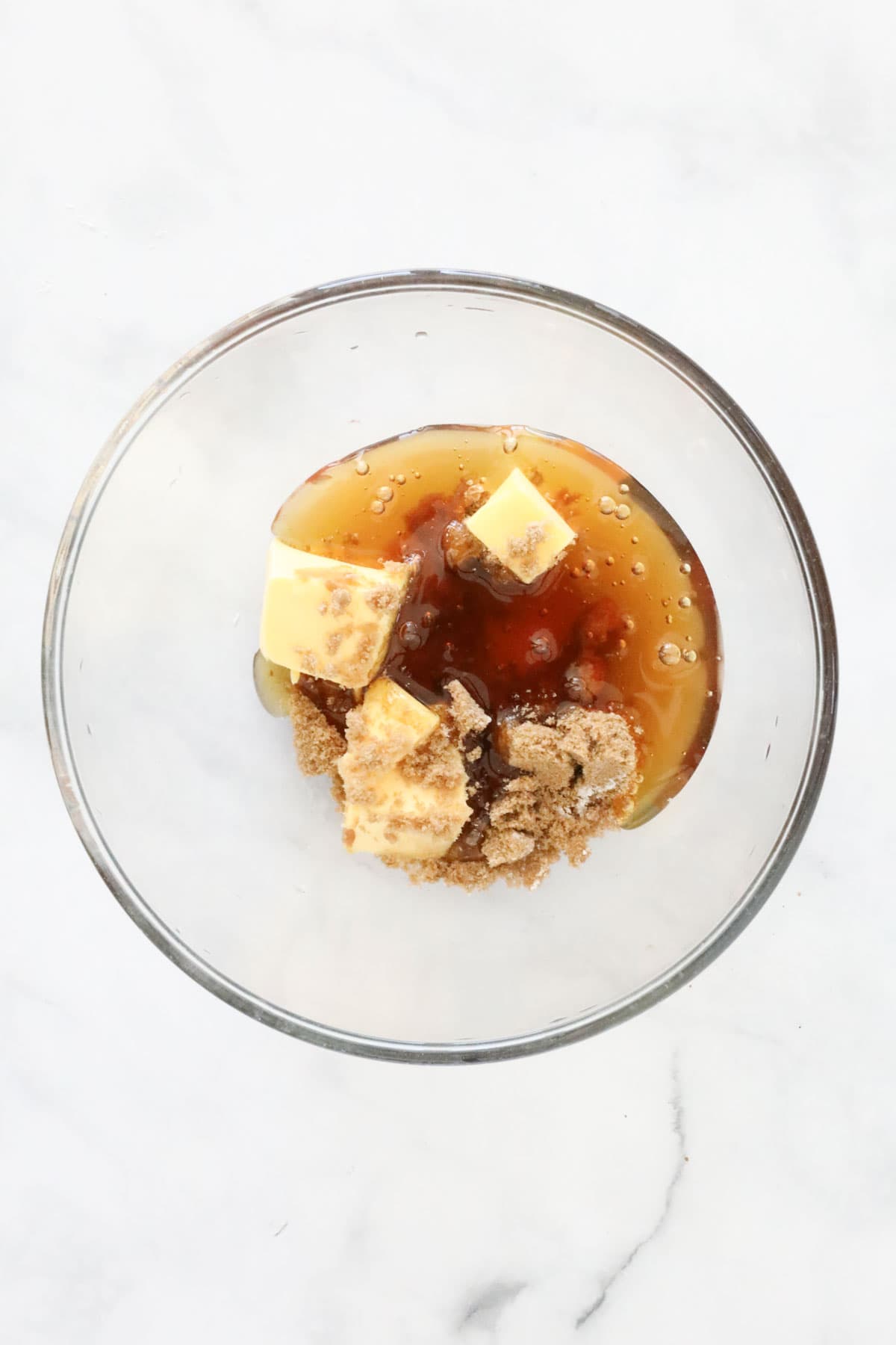 Butter, honey and brown sugar in a heat proof bowl.