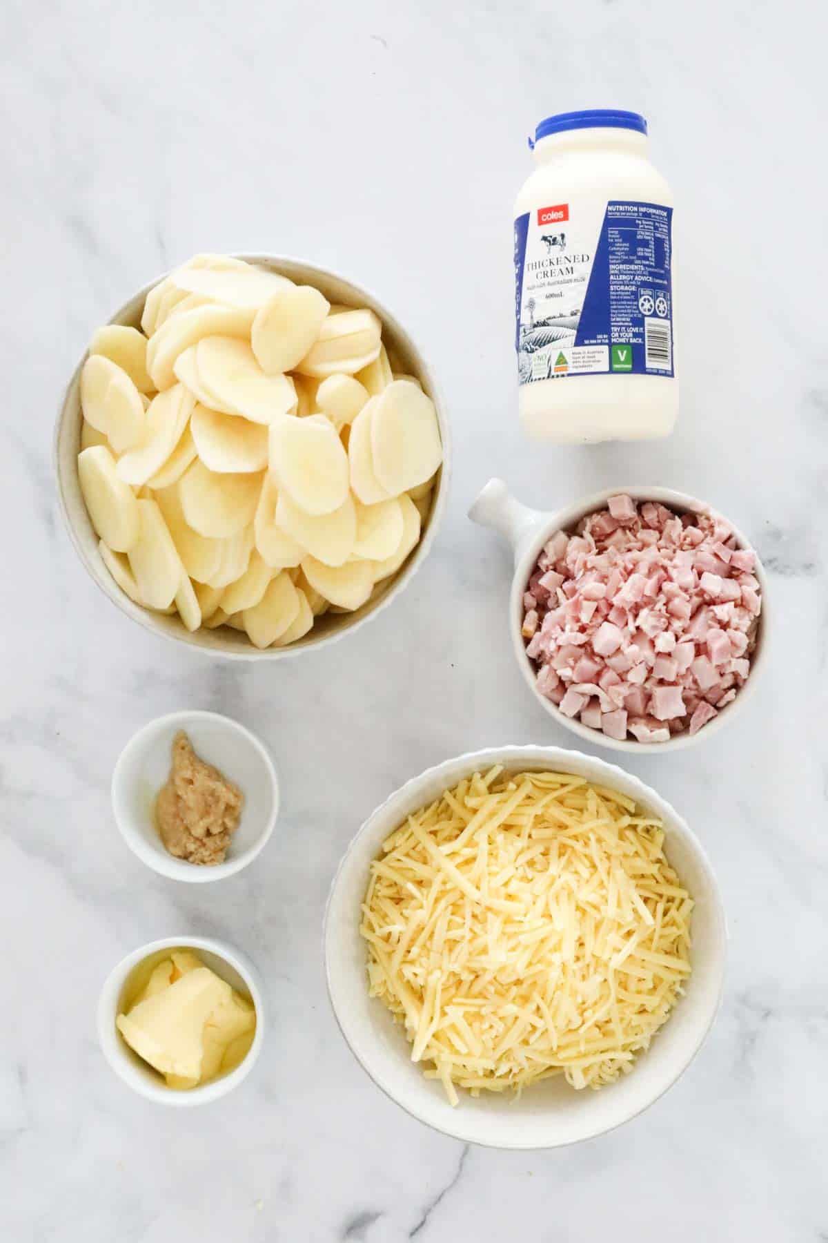 Ingredients needed to make the recipe measured out and placed in individual bowls.