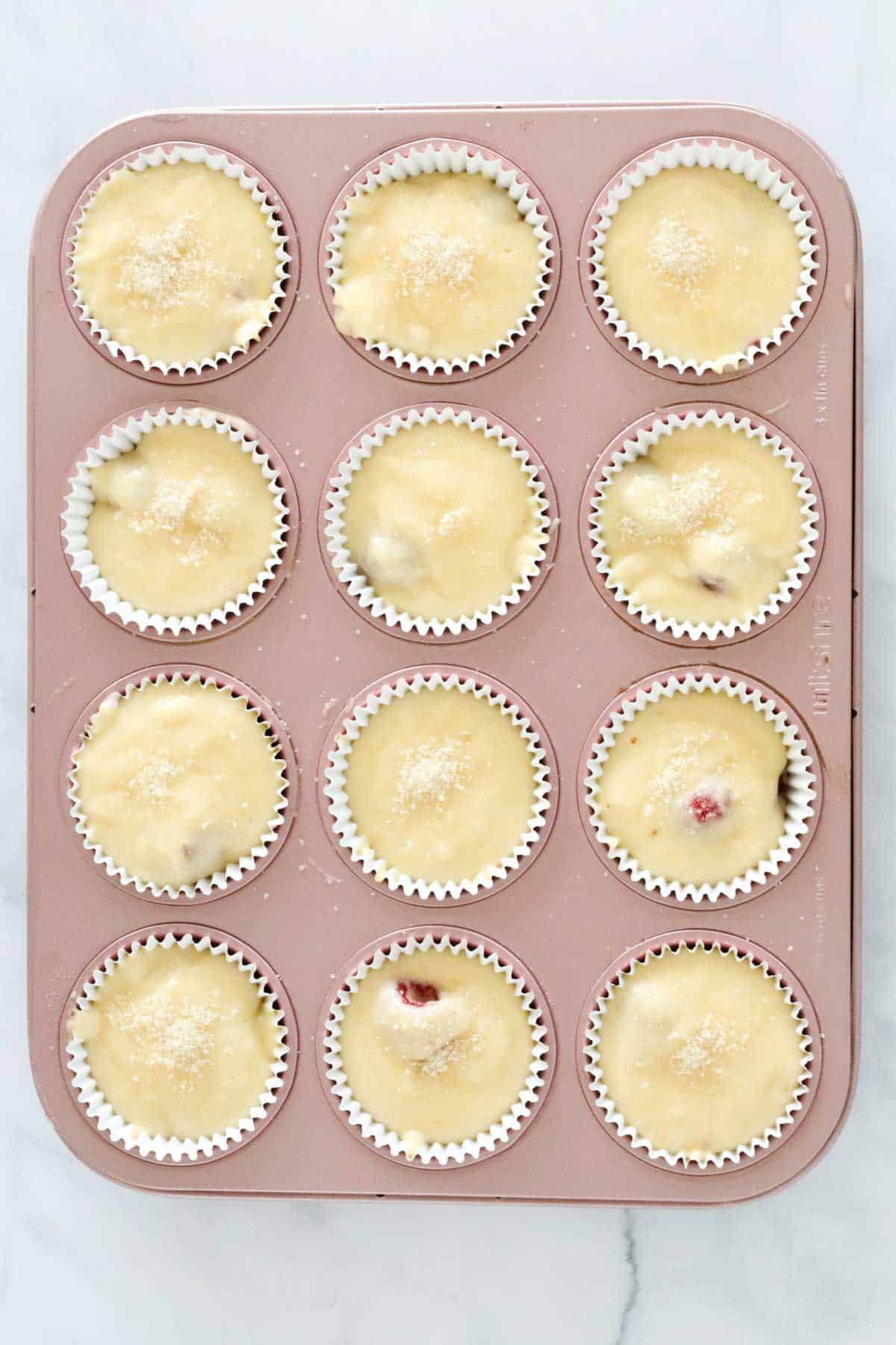 Muffin cases filled, ready to bake.