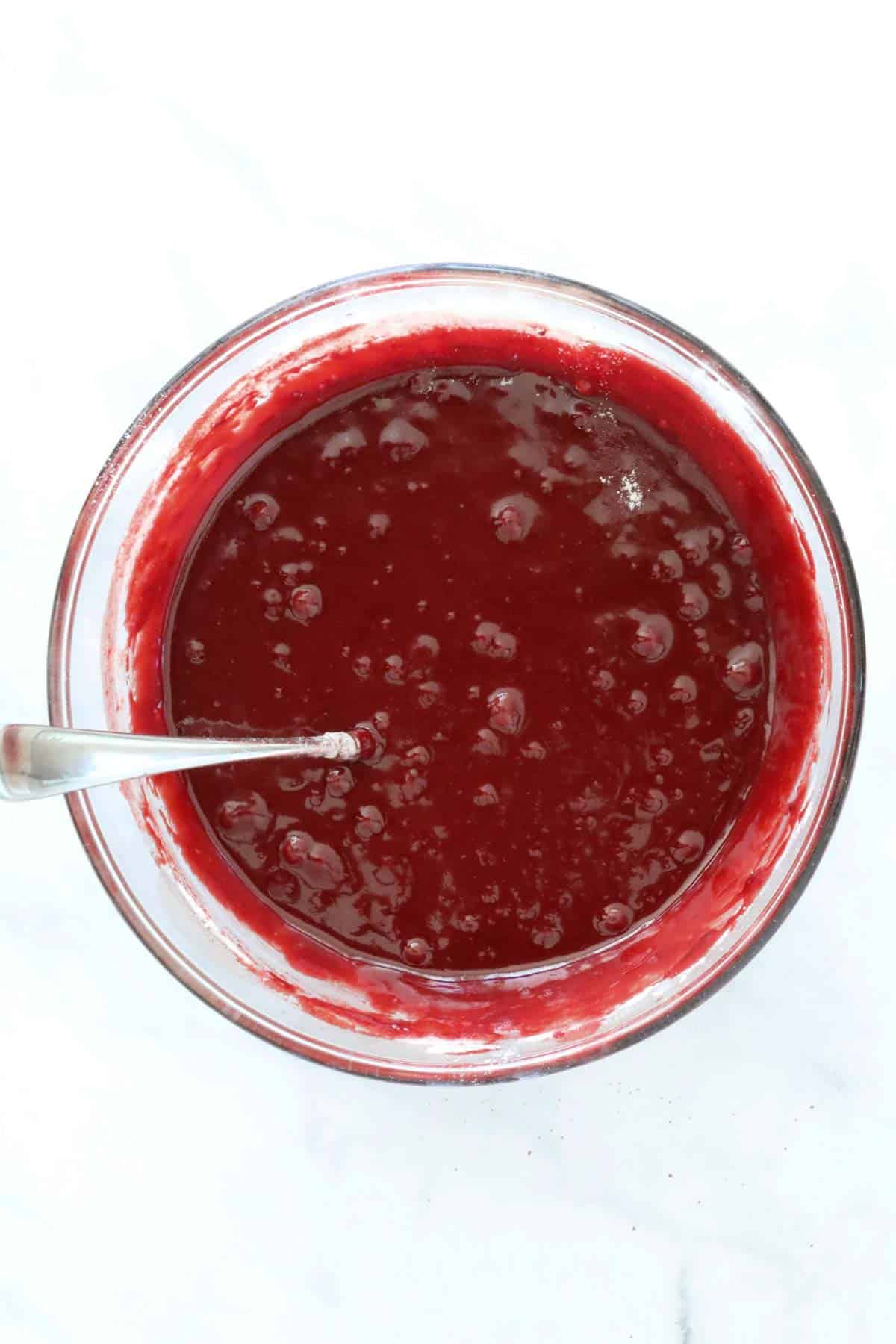 The combined red velvet brownie batter in a mixing bowl.