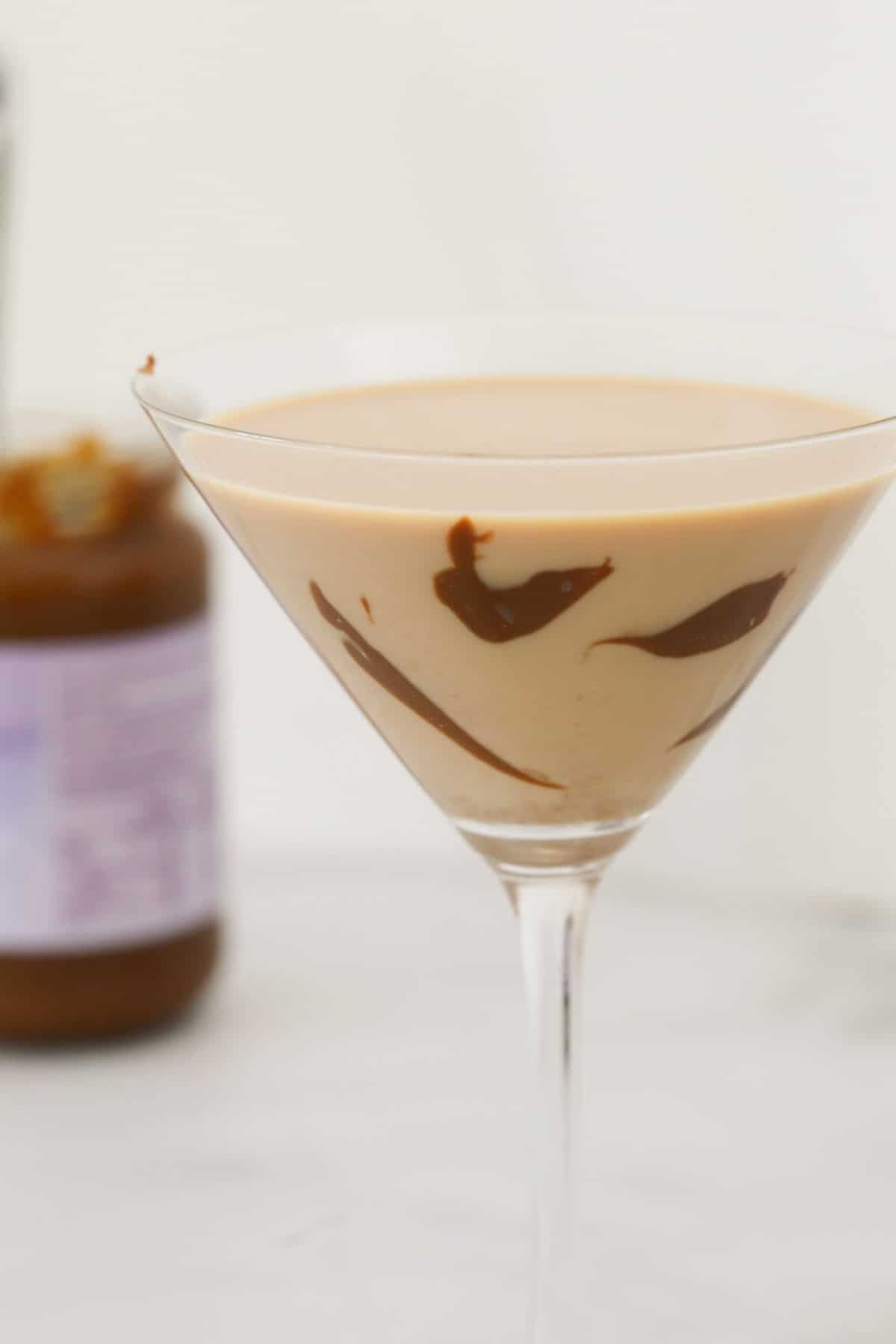 Caramel swirled inside a cocktail made with salted caramel and Baileys.