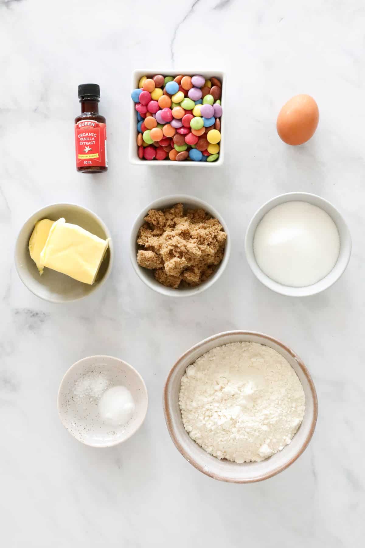 Ingredients needed to make the cookies weighed out and placed in individual bowls.