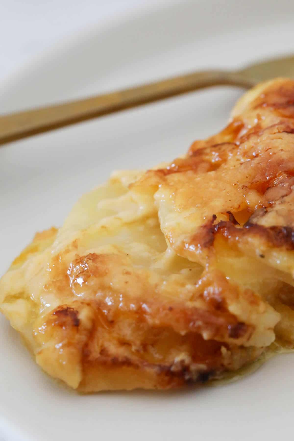 A serve of vegetable bake on a white plate.