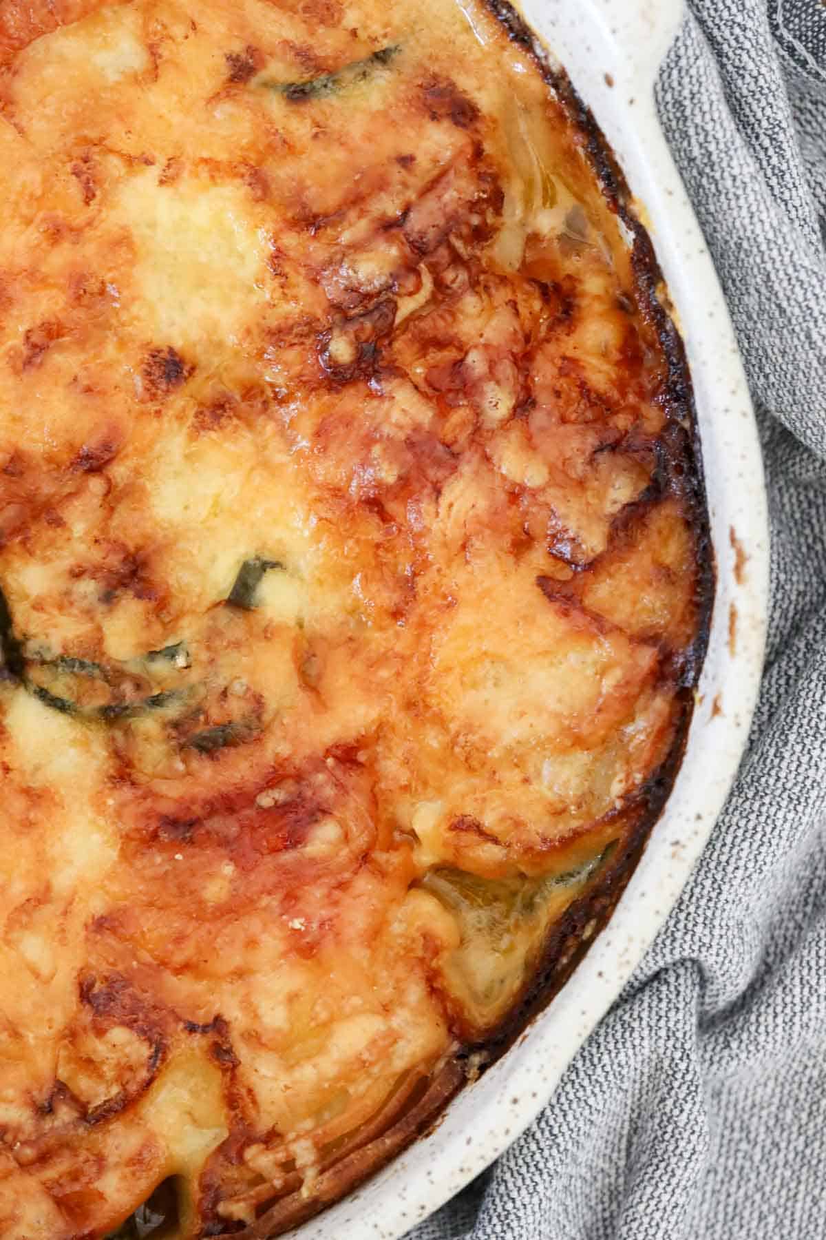 Baked vegetable au gratin with a topping of golden melted cheese.