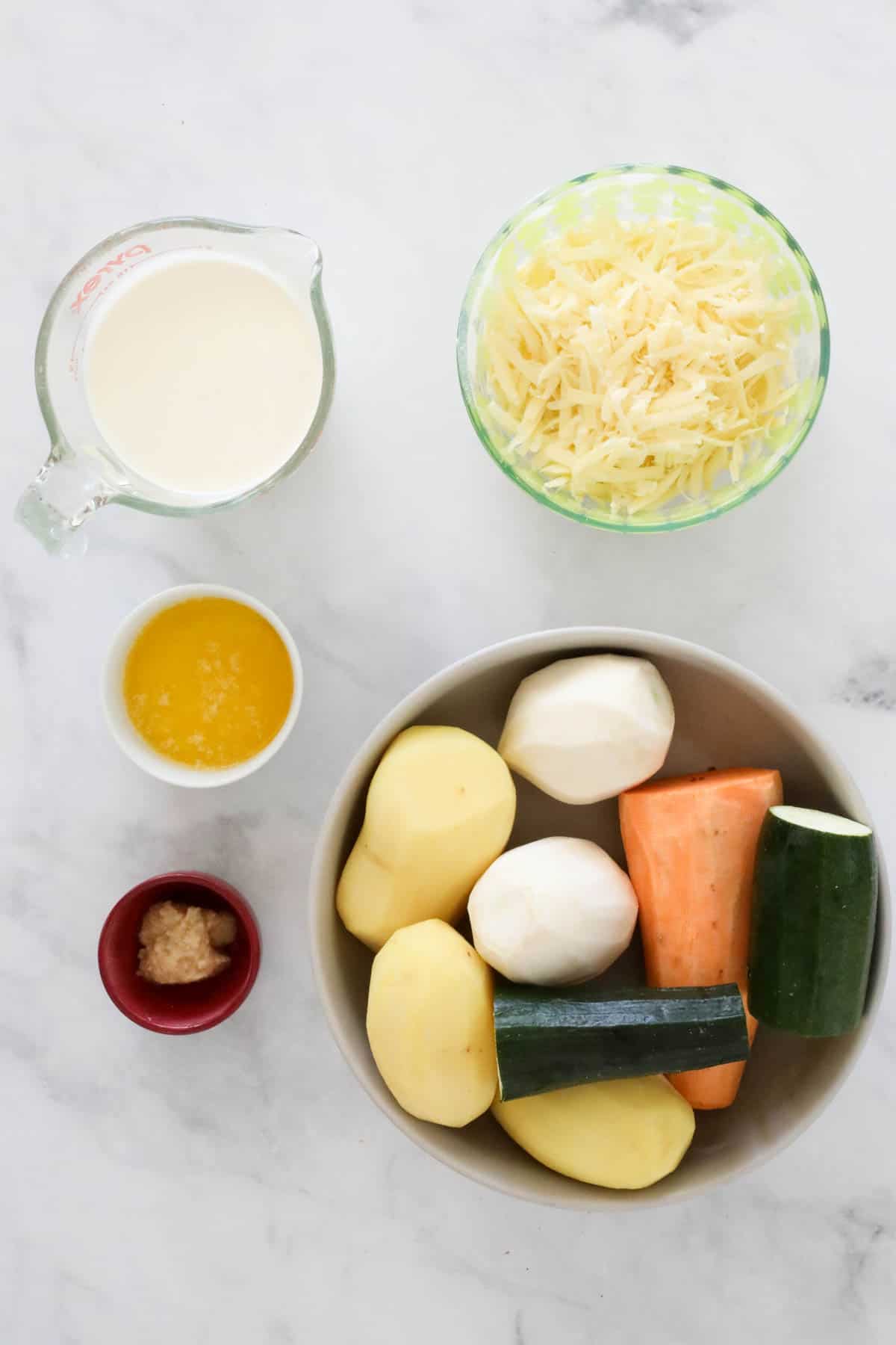 Ingredients needed to make the recipe placed in individual bowls.