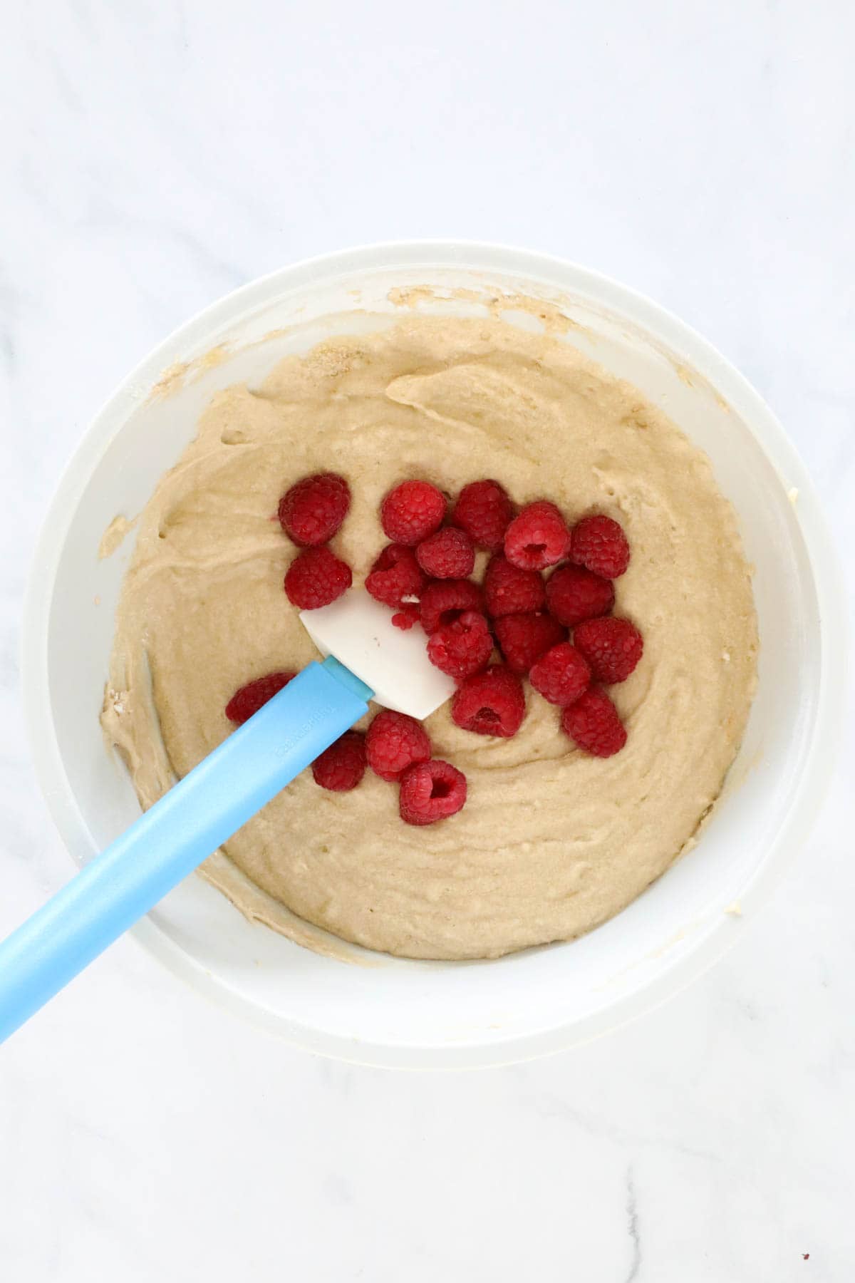 Frozen raspberries added to be gently stirred through with a rubber spatula.