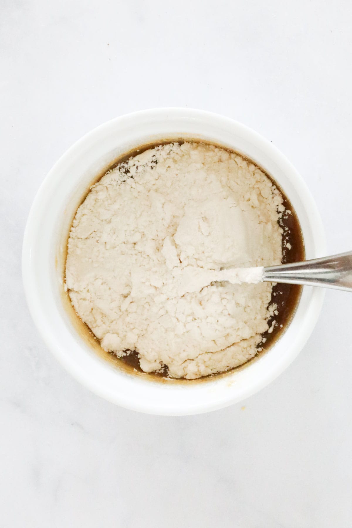 Plain flour added to the mug cake mix.