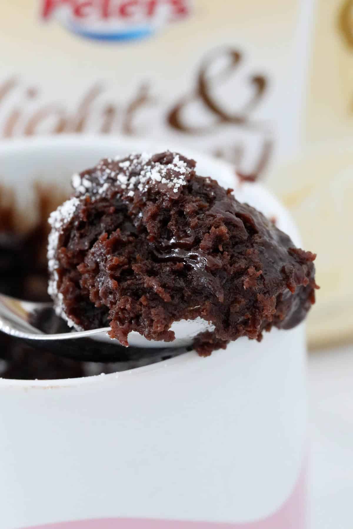 A spoonful of gluten free chocolate cake.