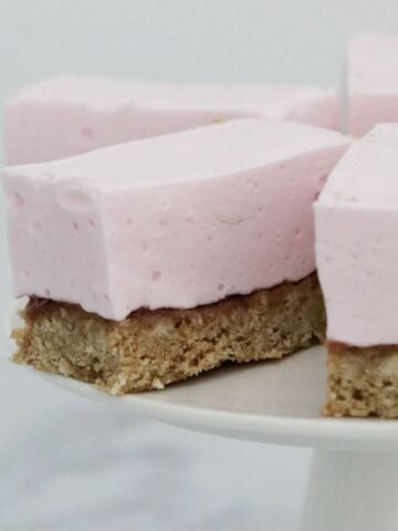 Fluffy marshmallow pink slice with a crunchy wwet-bix base.