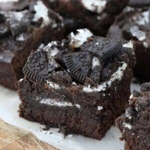 A piece of fudgy chocolate brownie with Oreos