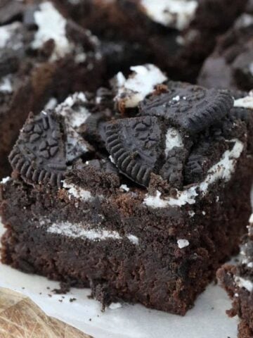 A piece of fudgy chocolate brownie with Oreos