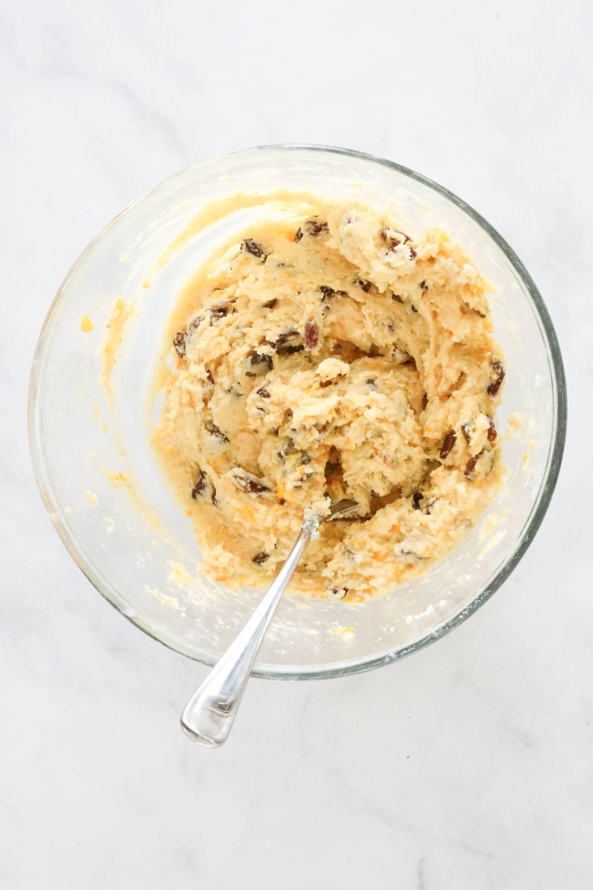 The mixture combined into a firm dough in the mixing bowl.