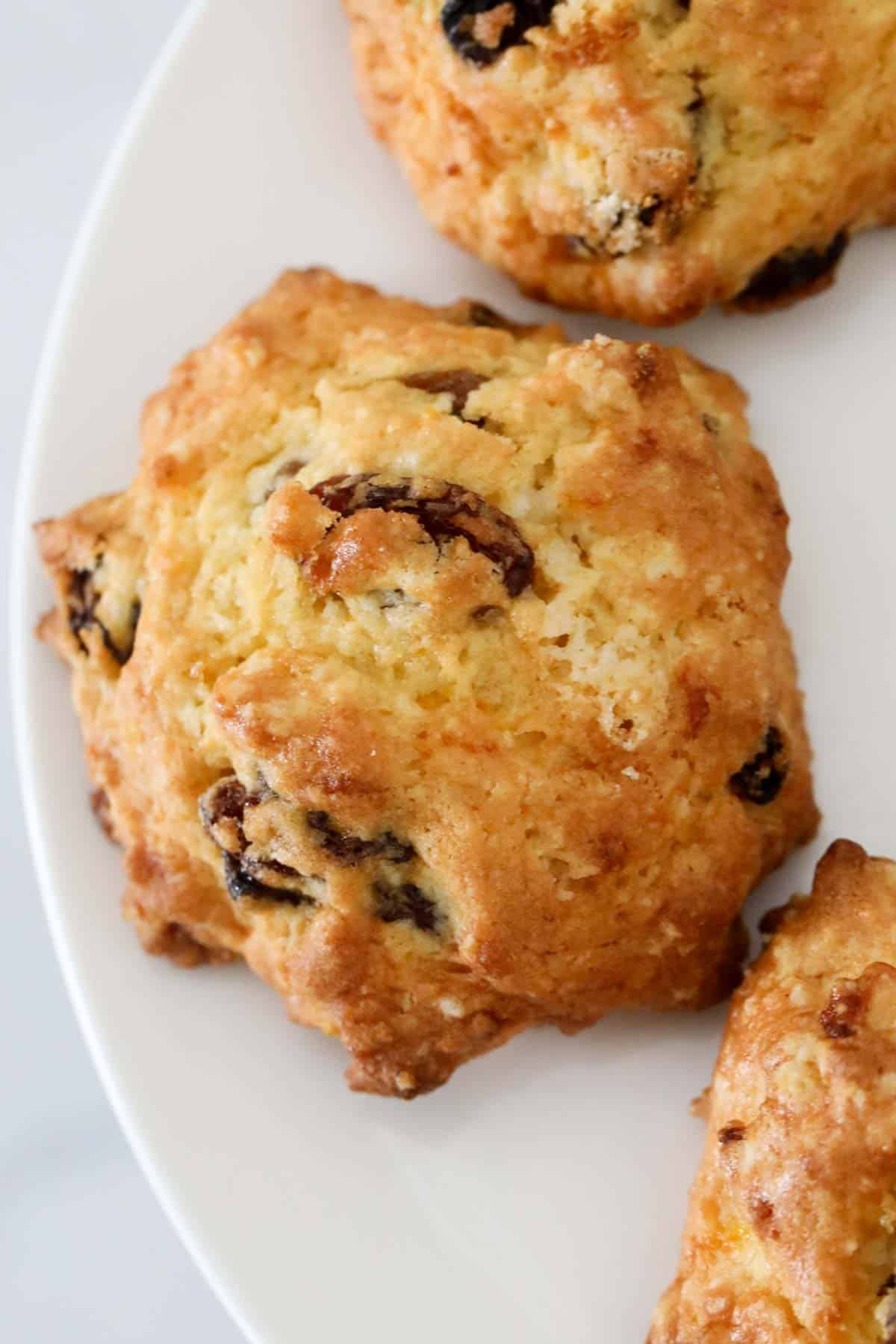 Close up of a rock cake on a white cake stand.