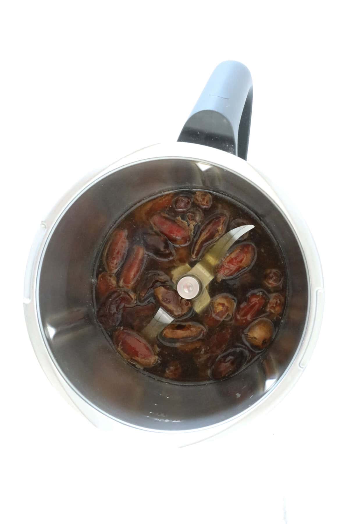 Dates and water in a thermomix jug.