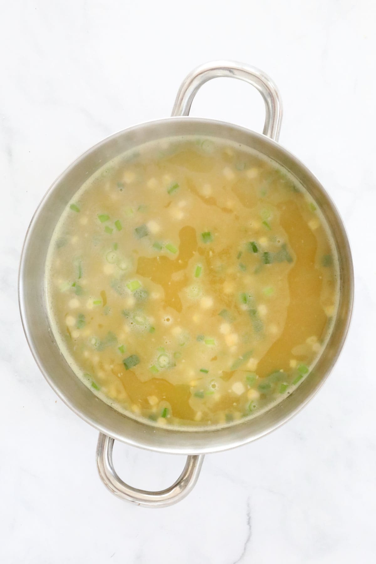 A pot of soup simmering.