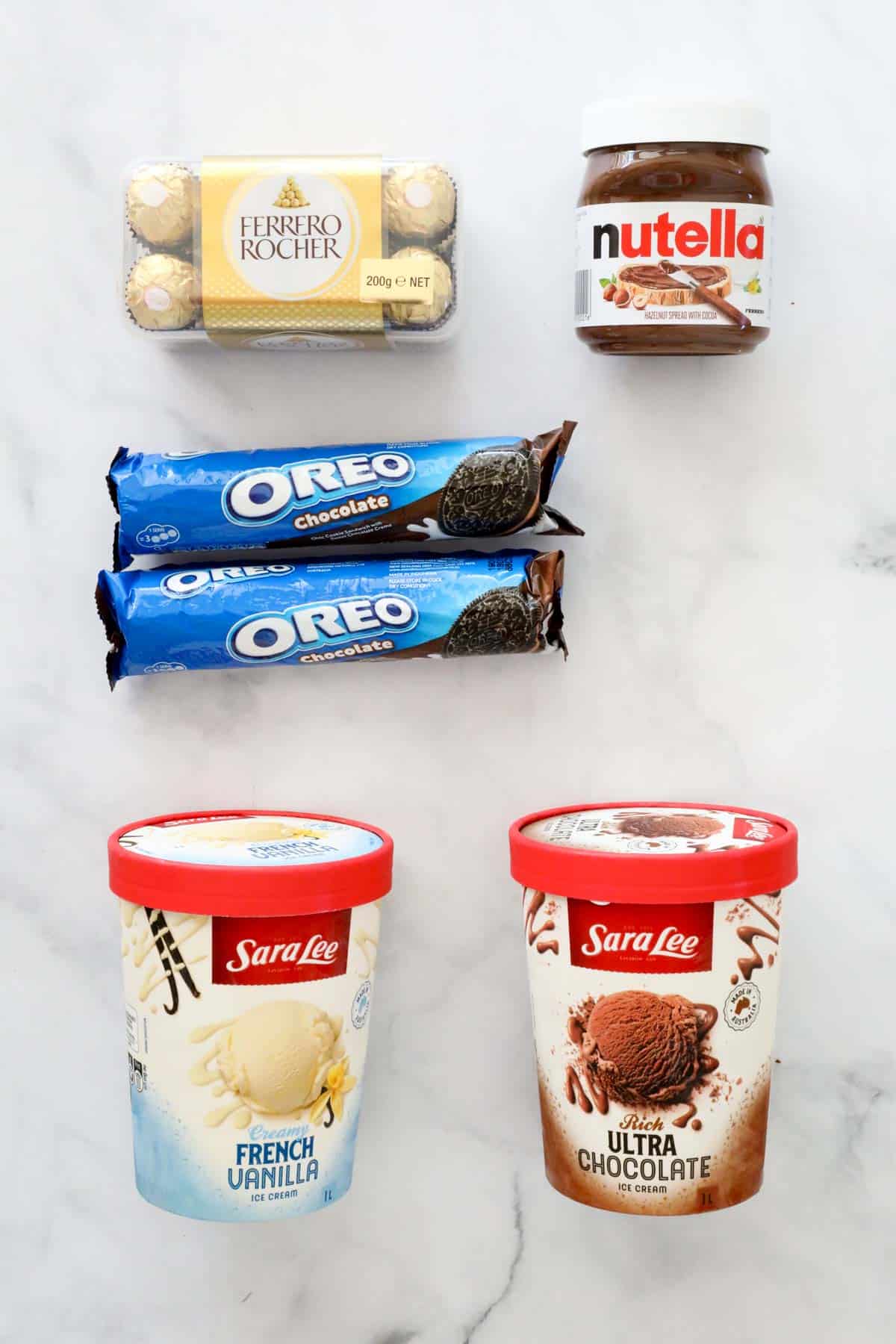 Chocolates, Nutella, Oreo's and ice cream on a bench.