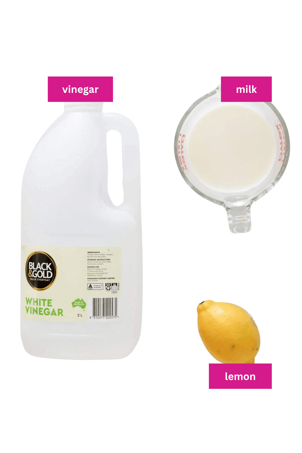 Vinegar, milk and a lemon on a white background.