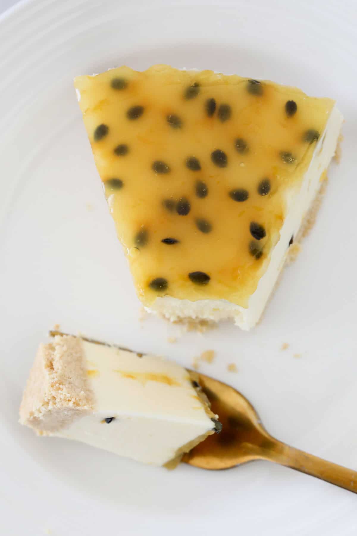 An overhead shot of a slice of passionfruit no-bake dessert.