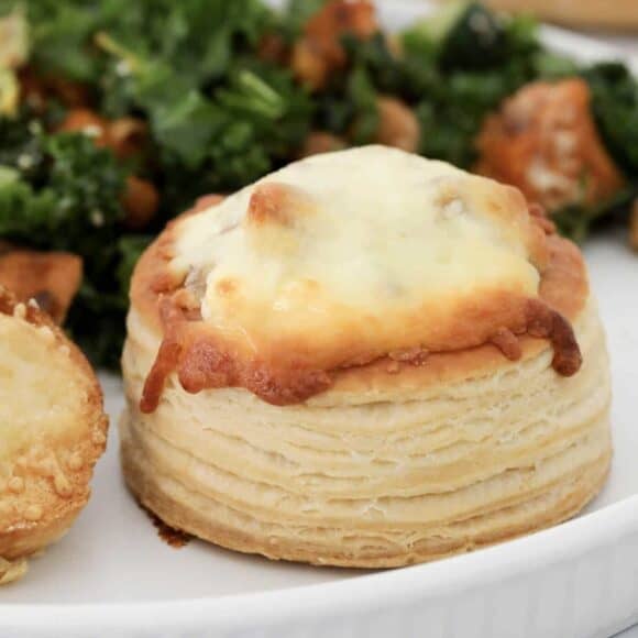Chicken and mushroom vol au vents on a serving board.