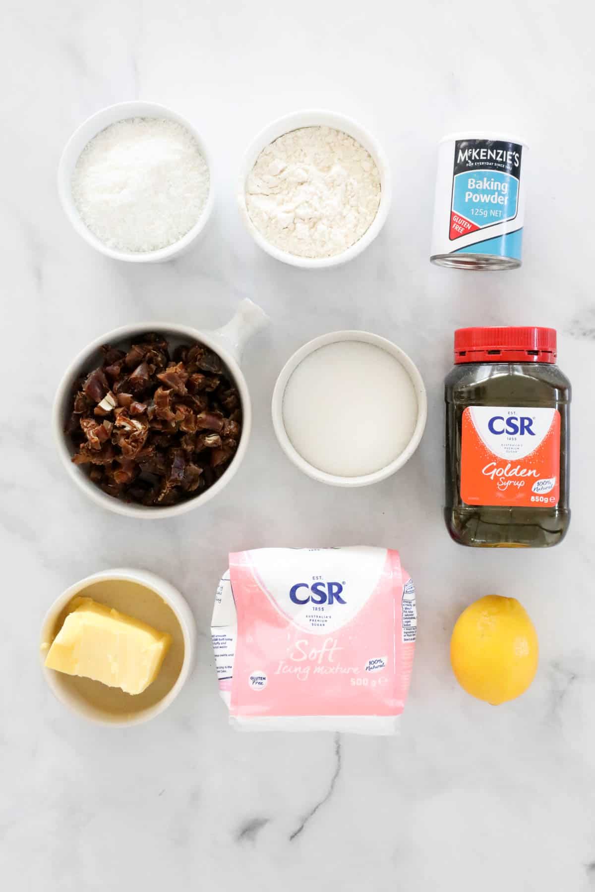 Ingredients required for baked date slice with lemon icing.