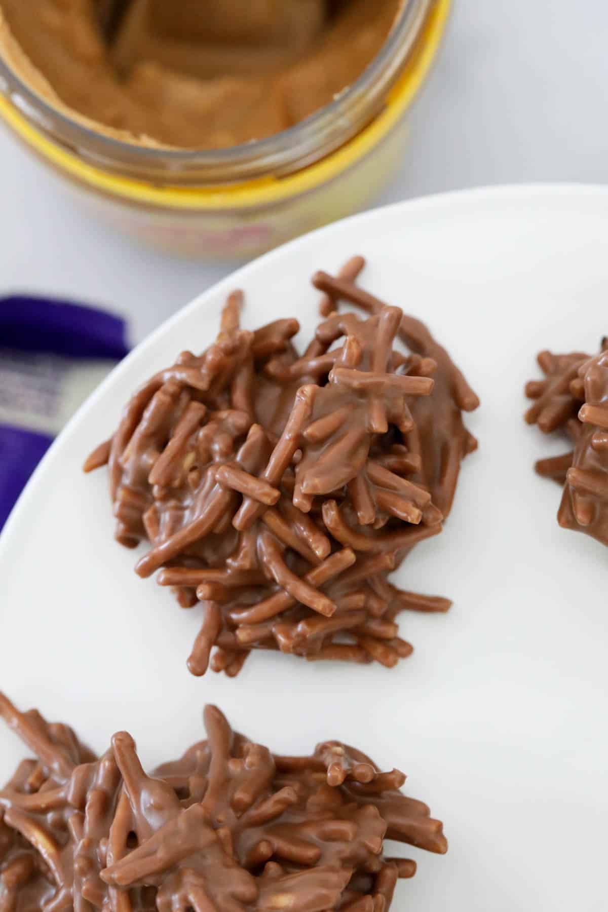 A close up of chocolate spiders showing the texture of the noodles.