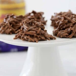 A plate full of crunchy chocolate, peanut butter and fried noodle 'spiders'