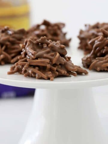 A plate full of crunchy chocolate, peanut butter and fried noodle 'spiders'